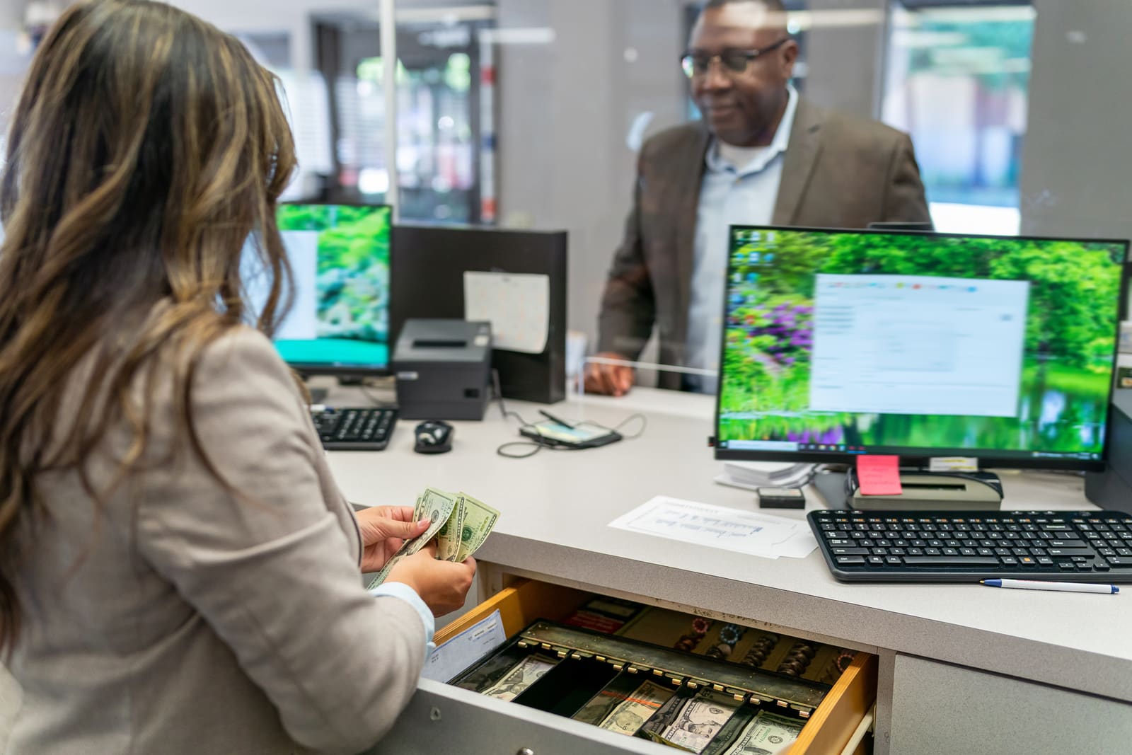 Operator receiving hands-on training at a service counter
